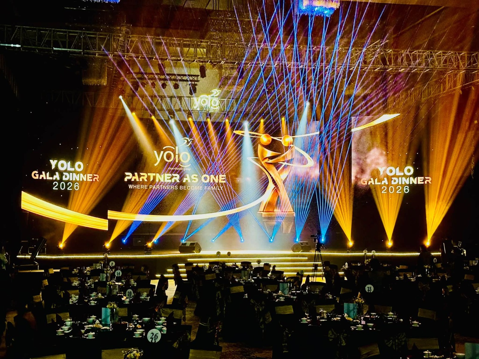 Black-tie corporate gala dinner with crystal centrepieces and mountain retreat views